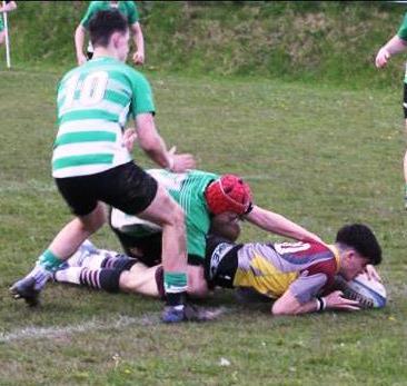 Owain Davies scores one of his three tries